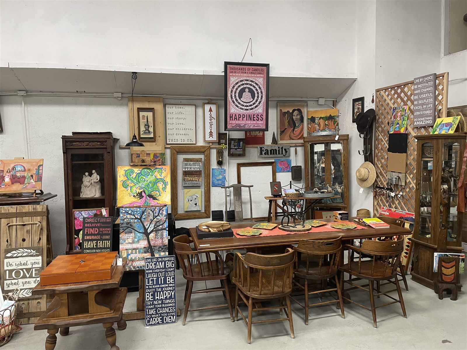 Original artwork and antique furniture inside the marketplace