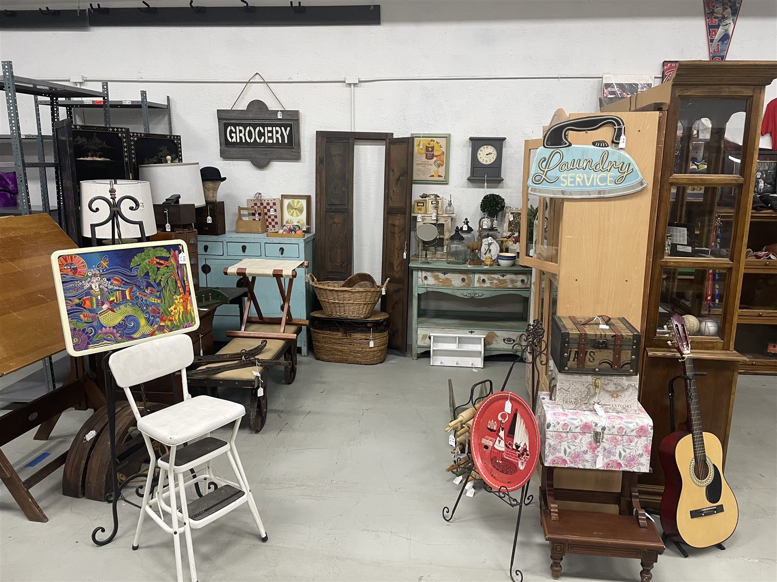 Vintage furniture, home decor, art and curiosities inside Raising Hope Collective